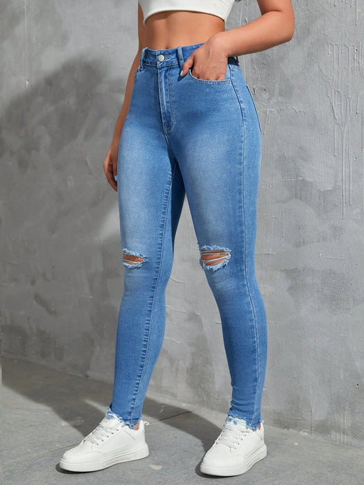 SHEIN EZwear Vaqueros ajustados desgastados de moda sólidos para mujer - Quierox - Tienda Online