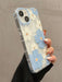 SHEIN Funda de TPU a prueba de golpes con estampado de flores blancas y azules para iPhone 15 - Quierox - Tienda Online