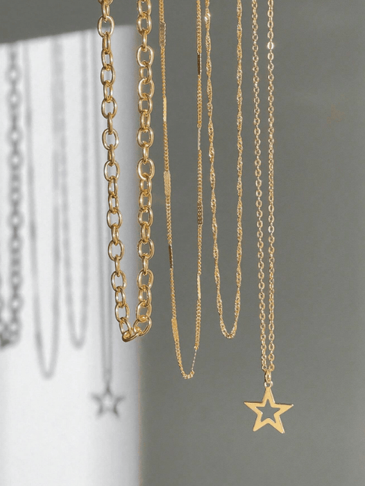 Shein Goth 4 piezas Conjunto de joyas con collar de cadena con colgante de estrella estilo punk dorado de moda - Quierox - Tienda Online