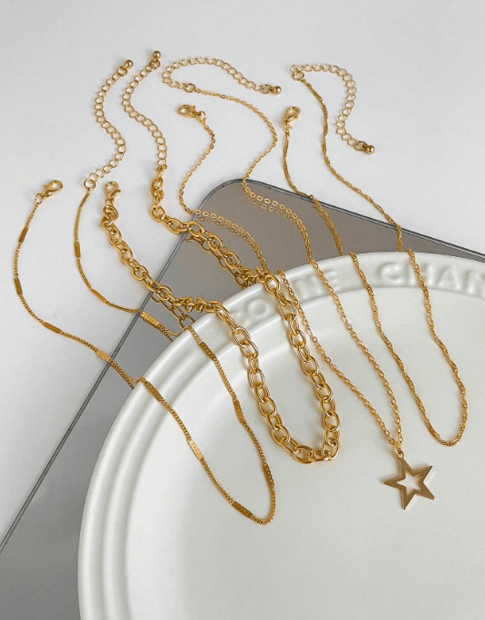 Shein Goth 4 piezas Conjunto de joyas con collar de cadena con colgante de estrella estilo punk dorado de moda - Quierox - Tienda Online
