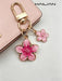 SHEIN HAILIAN 1 pieza Llavero con colgante en forma de flor de sakura de aleación ligera - Quierox - Tienda Online