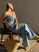 SHEIN Livesso Conjunto de 2 piezas de top de tirantes de mezclilla y pantalones - Quierox - Tienda Online