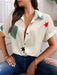 SHEIN LUNE Blusa informal de manga corta con estampado aleatorio de corazones y estrellas para mujeres - Quierox - Tienda Online