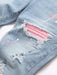 SHEIN Manfinity Roughcore Jeans casuales ajustados con bolsillos desgastados para hombres - Quierox - Tienda Online