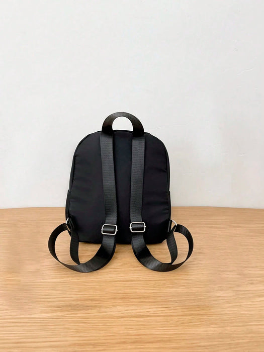 SHEIN Mochila de moda ZAOSHANGHAO con diseño de letras y pompones, portátil y plegable - Quierox - Tienda Online