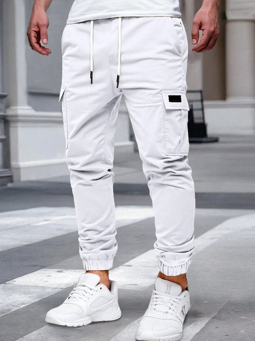 SHEIN Pantalones cargo casuales versátiles con cordón ajustable en la cintura para hombre - Quierox - Tienda Online