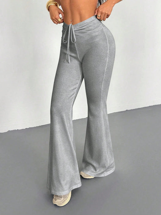 SHEIN Pantalones largos cómodos de corte ajustado y acampanados - Quierox - Tienda Online