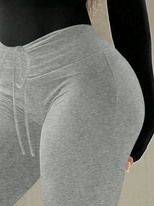 SHEIN Pantalones largos cómodos de corte ajustado y acampanados - Quierox - Tienda Online