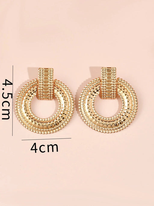 SHEIN Pendientes colgantes redondos de metal texturizado - Quierox - Tienda Online