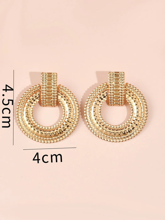 SHEIN Pendientes colgantes redondos de metal texturizado - Quierox - Tienda Online