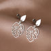 Shein Pendientes de acero inoxidable clásicos vintage con forma de gota de agua y hojas de plantas - Quierox - Tienda Online
