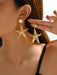 SHEIN Pendientes largos estrella de mar - Quierox - Tienda Online