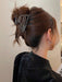 SHEIN Pinza para el cabello con forma de garra de esqueleto de terror - Quierox - Tienda Online