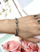 SHEIN Pulsera De Brazalete De Acero Inoxidable Con Forma De Gancho - Quierox - Tienda Online
