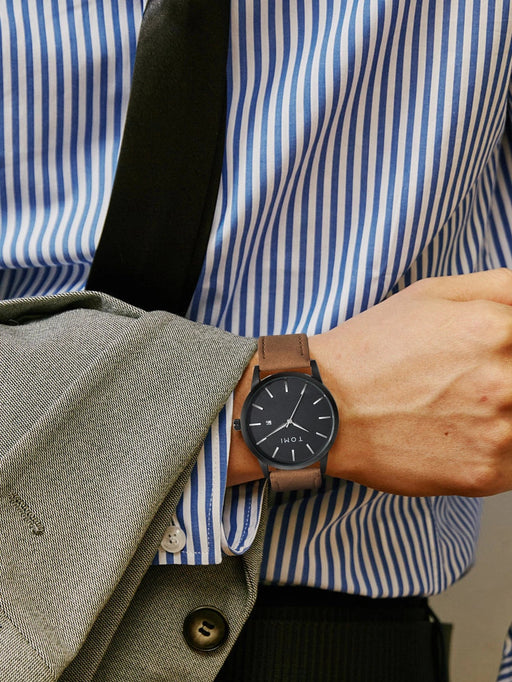 SHEIN TOMI Reloj de cuarzo minimalista redondo con puntero de fecha - Quierox - Tienda Online