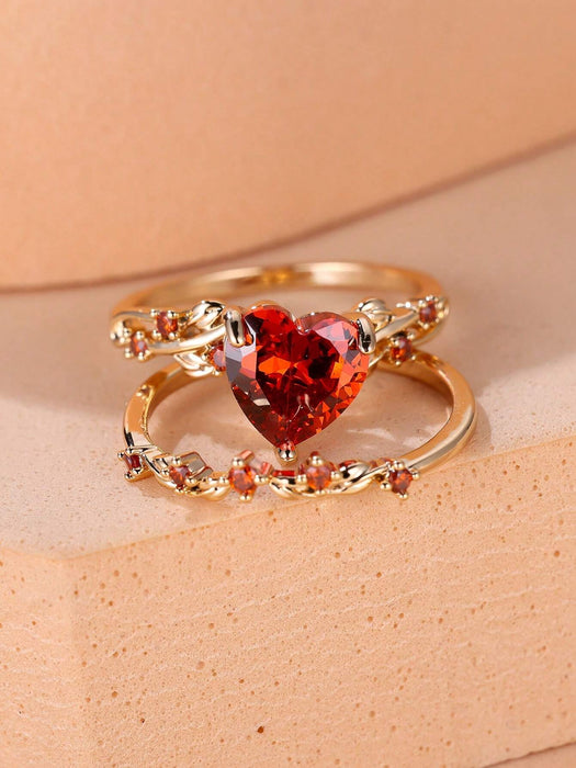 SHEIN Vanel Set de 2 anillos con garra incrustada con corazón rojo y zirconia - Quierox - Tienda Online