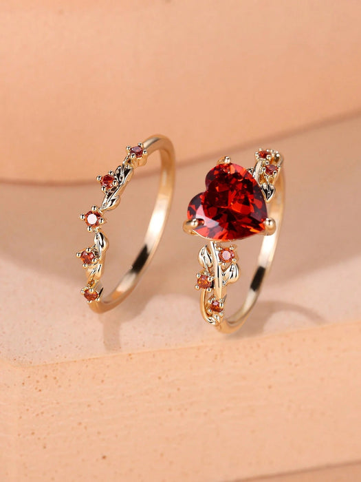 SHEIN Vanel Set de 2 anillos con garra incrustada con corazón rojo y zirconia - Quierox - Tienda Online