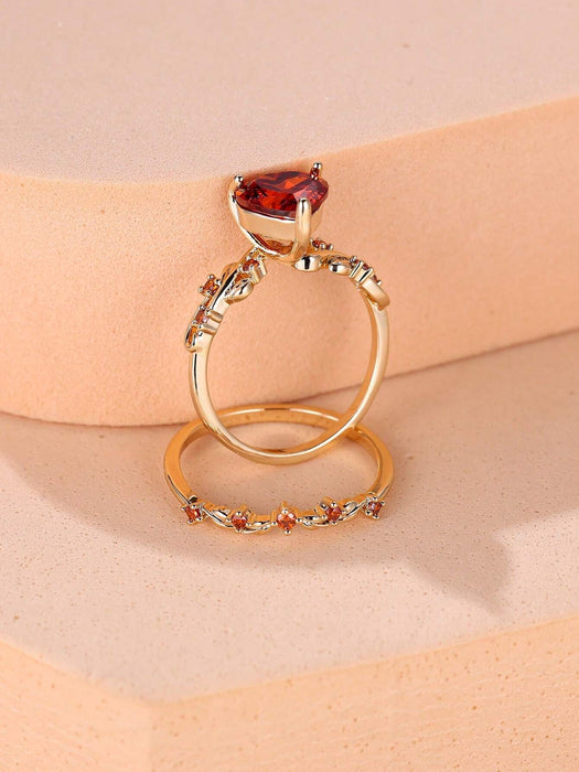 SHEIN Vanel Set de 2 anillos con garra incrustada con corazón rojo y zirconia - Quierox - Tienda Online