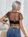 Top de malla transparente con bordado floral - Quierox - Tienda Online
