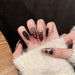 Uñas press on almendradas rojas y negras con estampado de leopardo y diamantes de imitación, hechas a mano - Quierox - Tienda Online
