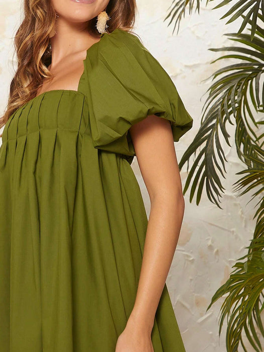 Vestido plisado con mangas abullonadas y lazo en la espalda descubierta de L'Amorae - Quierox - Tienda Online