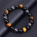 Pulsera de piedra negra y café de 10 mm - Quierox - Tienda Online